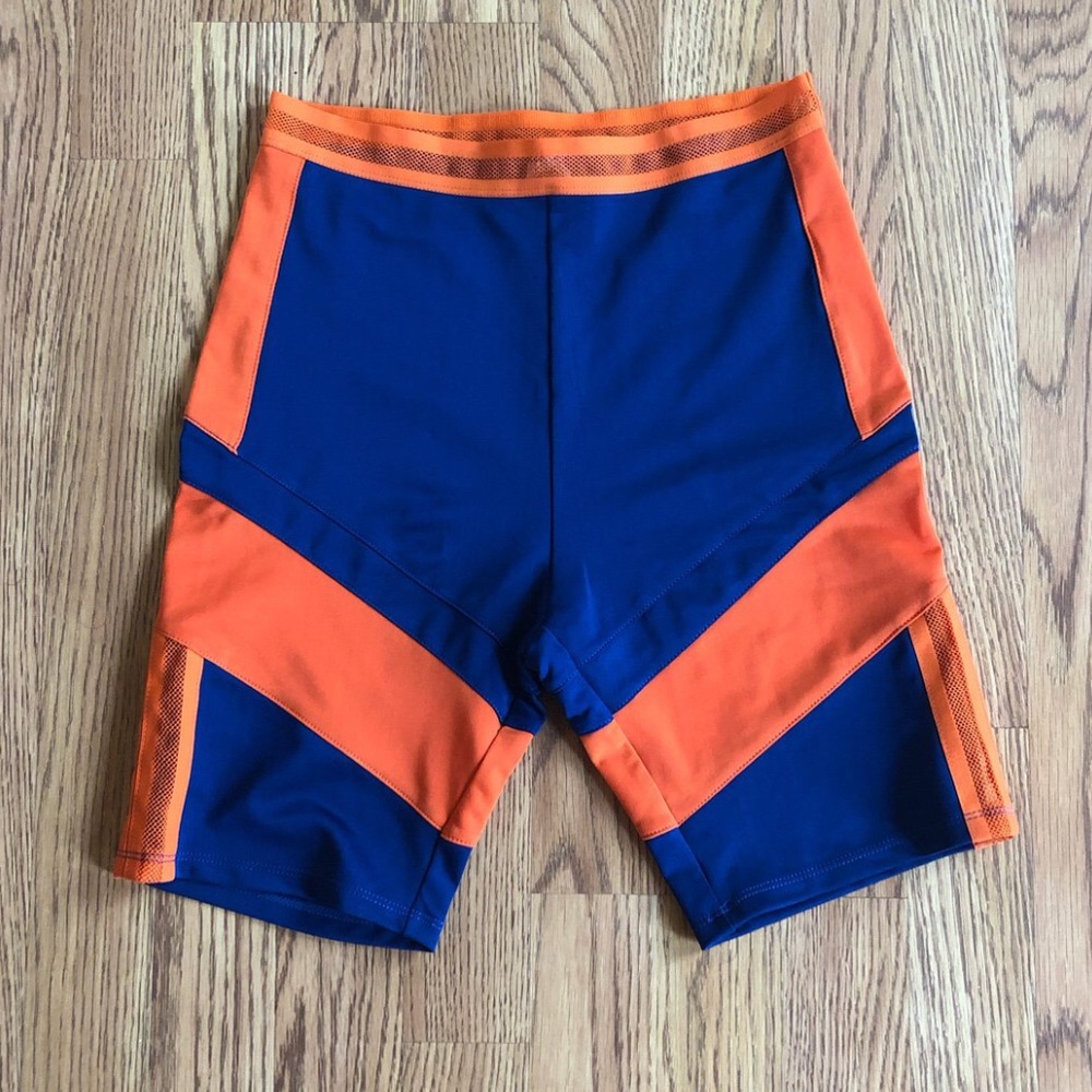 Black and orange color block biker shorts